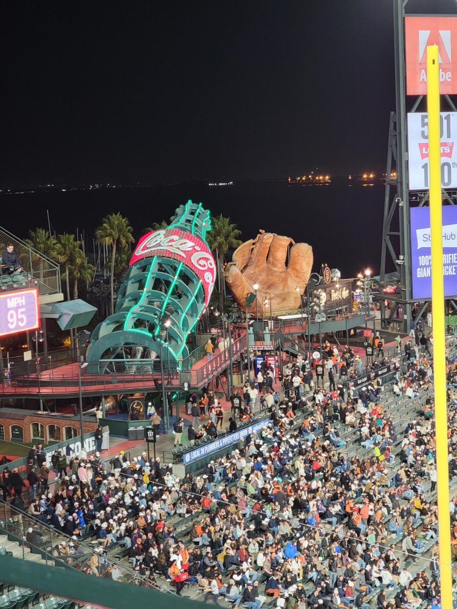 A view of the Coca-Cola bottle and baseball glove statues at Oracle Park in San Francisco.